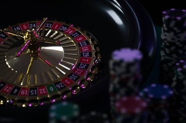 Live dealer studio showing Andar Bahar table with card layouts and betting zones visible from multiple camera angles